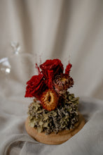 Load image into Gallery viewer, Dried red and gold flowers on a wooden base against a neutral background