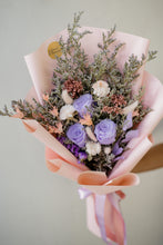 Load image into Gallery viewer, Bouquet of flowers with pink paper wrap on a light background
