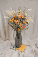 Load image into Gallery viewer, Vase arrangement of dried flowers in a gray vase on a white fabric background
