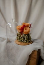 Load image into Gallery viewer, Preserved floral arrangement with orange and red tones under a glass dome
