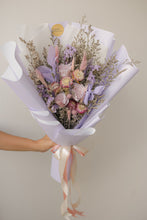 Load image into Gallery viewer, Bouquet of flowers wrapped in white paper with a ribbon against a plain background
